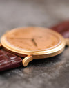 Opposite side profile highlighting the polished bezel, slim case and curved lugs of the Patek Philippe 5022R.