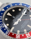 Macro view of Rolex GMT-Master 1675 Mark 2 matte dial and blue Pepsi bezel.