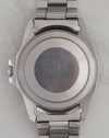Caseback of Rolex GMT-Master 1675 with folded bracelet and stamped 358 end links.