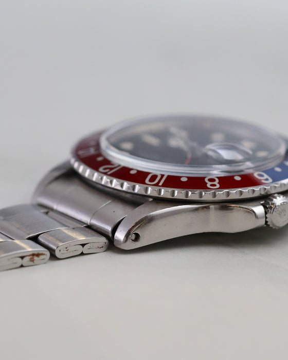 Opposite side profile of Rolex GMT-Master 1675 case and folded bracelet.