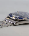 Side view highlighting the vintage Rolex GMT-Master 1675 case and folded bracelet construction.
