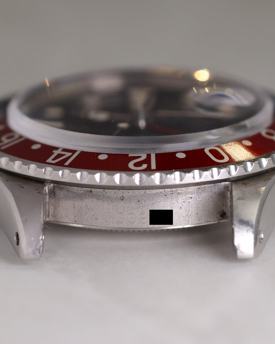 Rolex GMT-Master 1675 case engraving showing the 3.008-million serial number.