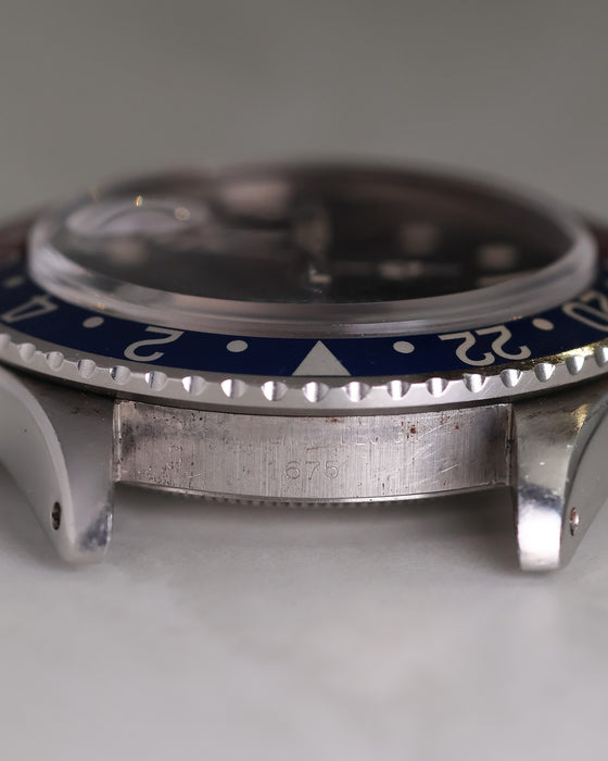 1. Rolex GMT-Master 1675 reference engraving between the lugs.