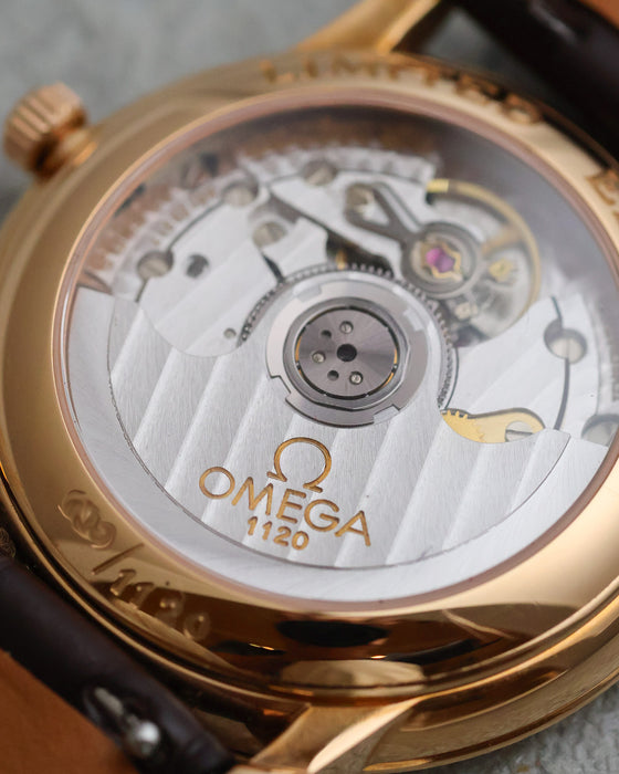 Close-up of automatic Omega calibre 1120 visible through the exhibition caseback.