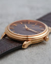 Crown-side profile of the Omega De Ville Prestige with signed Omega crown.