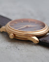 Crown-side profile of the Omega De Ville Prestige with signed Omega crown.