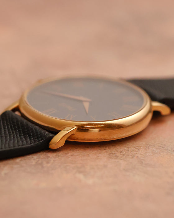 Low-angle profile of the Piaget Tradition 80035 highlighting the thin case and elongated lugs.