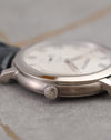Macro view of the signed Audemars Piguet crown on the 18K white-gold Jules Audemars case.