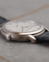 Angled profile of the Audemars Piguet 15056BC showing its crown, polished bezel and sculpted lug.