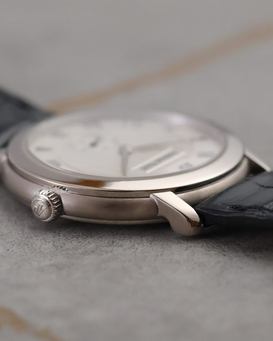 Angled profile of the Audemars Piguet 15056BC showing its crown, polished bezel and sculpted lug.