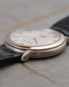 Close side profile of the white-gold Jules Audemars case and polished lug.