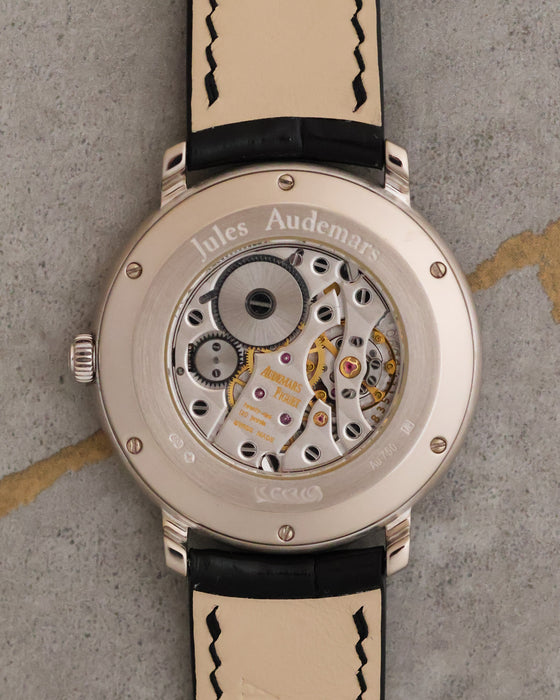 Exhibition caseback of the Jules Audemars 15056BC showing the manual-winding movement and engraved caseback.