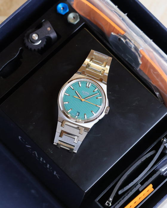 Complete Czapek Antarctique Fratello Edition set with watch, presentation box, straps and accessories.