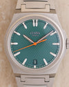 Front view of the Czapek Antarctique Fratello Edition showing its Viridian Green textured dial and orange seconds hand.