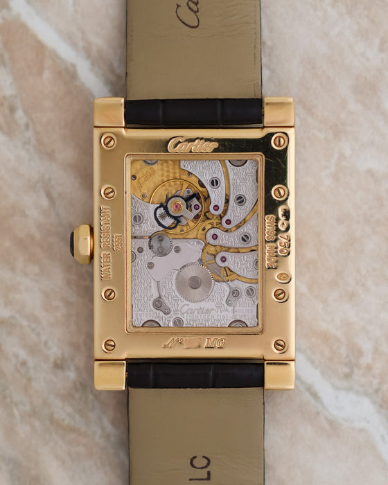 Caseback view of the Cartier Tank à Vis ref. 2551 showing its sapphire display back and decorated manual-winding movement.