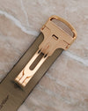 Original 18K yellow-gold Cartier deployant clasp fitted to the black leather strap of the Tank à Vis Dual Time.