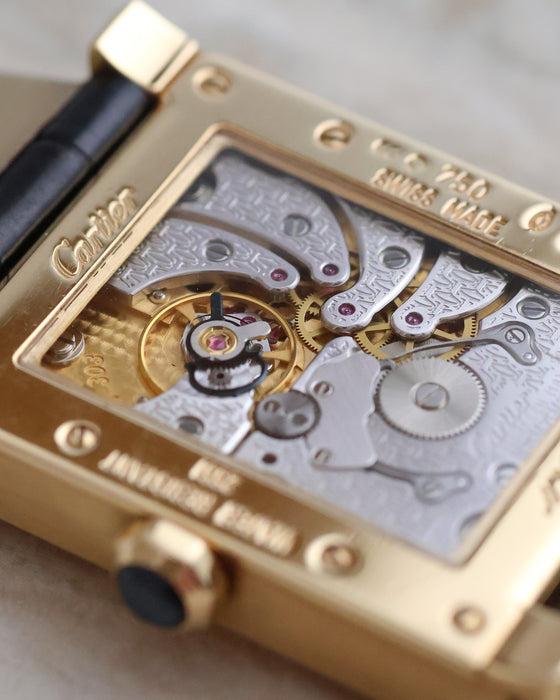 Exhibition caseback showing the decorated manual-winding Cartier calibre 9901 MC.