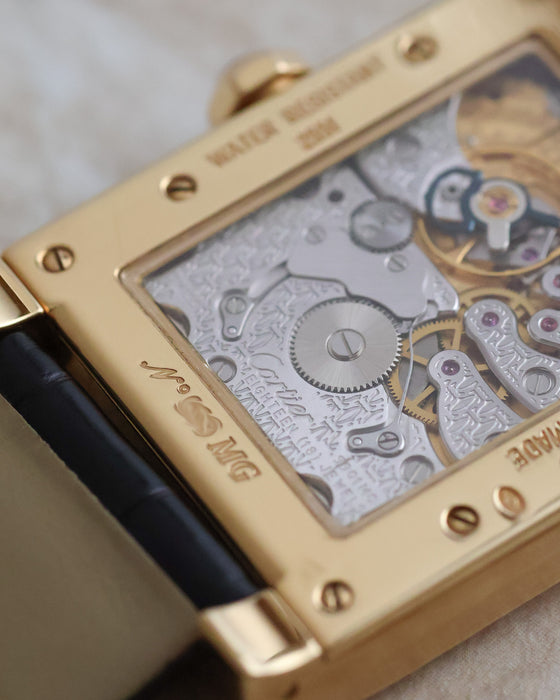 Macro view of the Cartier calibre 9901 MC and its repeating double-C bridge decoration.