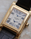Angled view of the Cartier Tank à Vis Dual Time ref. 2551 in 18K yellow gold.