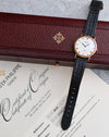 Patek Philippe Calatrava ref. 3919J in yellow gold displayed with its original presentation box and Certificate of Origin.