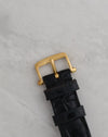 Original 18K yellow gold Van Cleef & Arpels pin buckle fitted to the black leather strap.