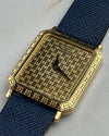 Elegant Piaget 7143 wristwatch featuring integrated gold grid motif and minimalist design, c. 1990s