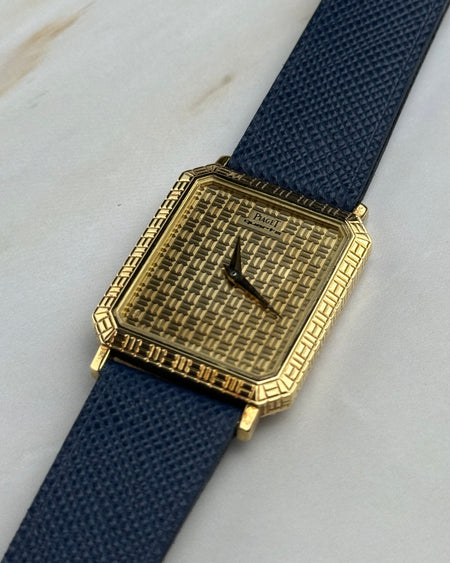 Piaget Ref. 7143 vintage dress watch in solid 18K yellow gold with Art Deco grid case and dia