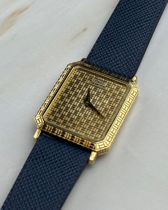 Piaget Ref. 7143 vintage dress watch in solid 18K yellow gold with Art Deco grid case and dia