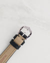 Original Cartier 18K white gold pin buckle showing engraved Cartier signature and gold hallmarks.