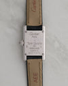 Caseback of the Cartier Mini Tank Ref. 1370 1 showing the Cartier Paris engraving, 18K gold marking and quartz designation.