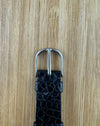 Close-up of original Audemars Piguet 18K white gold buckle engraved with AP logo