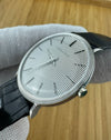 Side view of Audemars Piguet 4029 showing slim 18K white gold case and signed crown detail