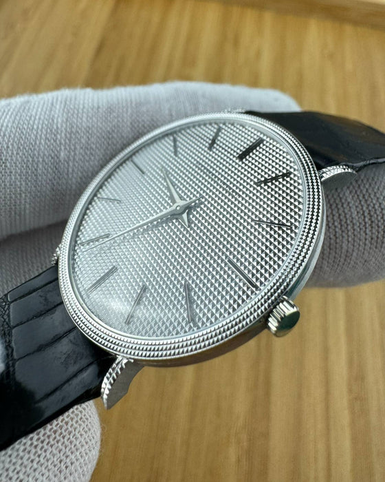 Side view of Audemars Piguet 4029 showing slim 18K white gold case and signed crown detail