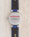 Stainless steel caseback of the Gérald Genta G3338.7 featuring the engraved GG emblem and reference number.