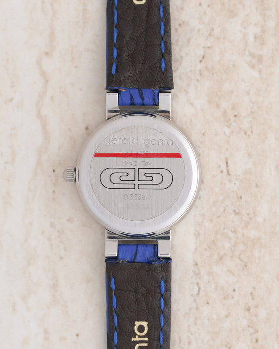 Stainless steel caseback of the Gérald Genta G3338.7 featuring the engraved GG emblem and reference number.