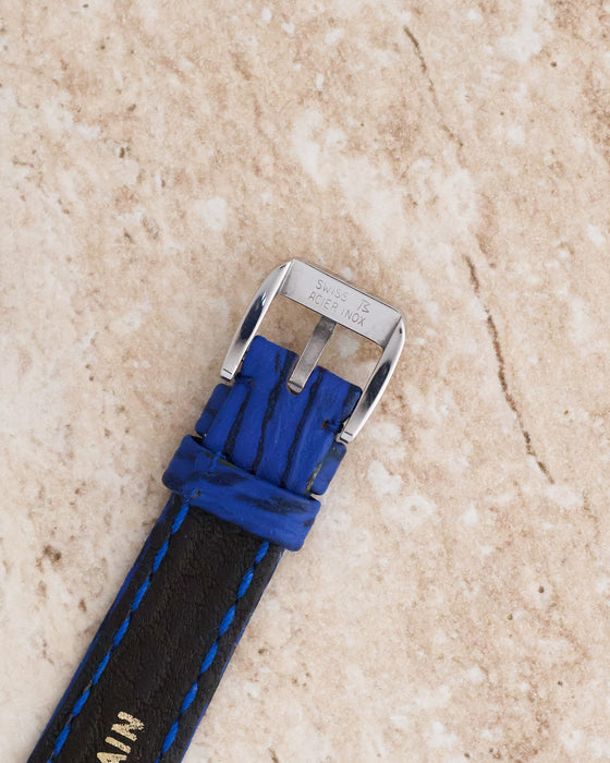 Reverse view of the original Gérald Genta buckle showing Swiss stainless steel markings.