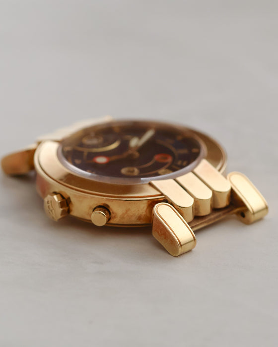 Side profile showing the Harry Winston Greenwich's signed crown, pusher and articulated lug construction.