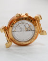 Angled view of Harry Winston Greenwich's exhibition caseback showing the automatic movement and signed rotor.