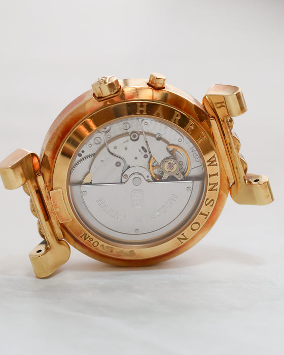 Angled view of Harry Winston Greenwich's exhibition caseback showing the automatic movement and signed rotor.