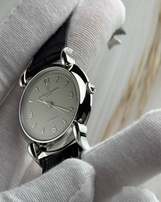 Close-up side angle of Vacheron Constantin Les Historiques watch with elegant curved lugs