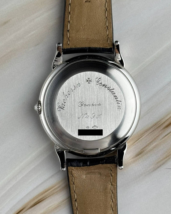 Original Vacheron Constantin platinum tang buckle attached to alligator strap