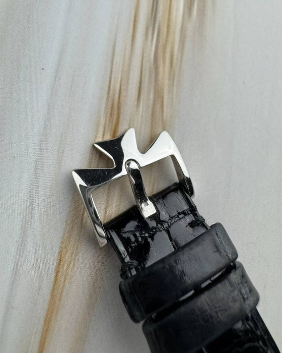 Close-up of signed Vacheron Constantin buckle in platinum, fitted on factory strap