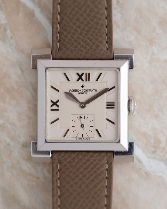 Front view of the Vacheron Constantin Carrée Historique 91030 in 18K white gold, showing its silvered geometric dial and small seconds display.