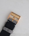 Reverse of the A. Lange & Söhne 18K rose gold buckle showing gold hallmarks.