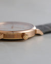 Detailed view of the A. Lange & Söhne signed winding crown and brushed rose gold case.