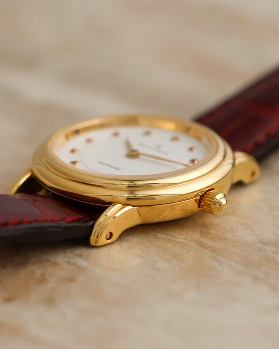 Side profile of the Blancpain Villeret 0096 showing its stepped gold bezel, fluted crown and sculpted lugs.