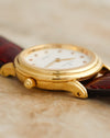 Detailed side view of the Blancpain Lady Villeret highlighting its curved gold lugs, polished case and crown.