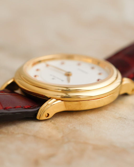 Macro photograph of the Blancpain Villeret 0096 showing the polished double-stepped bezel and decorative gold lug detailing.