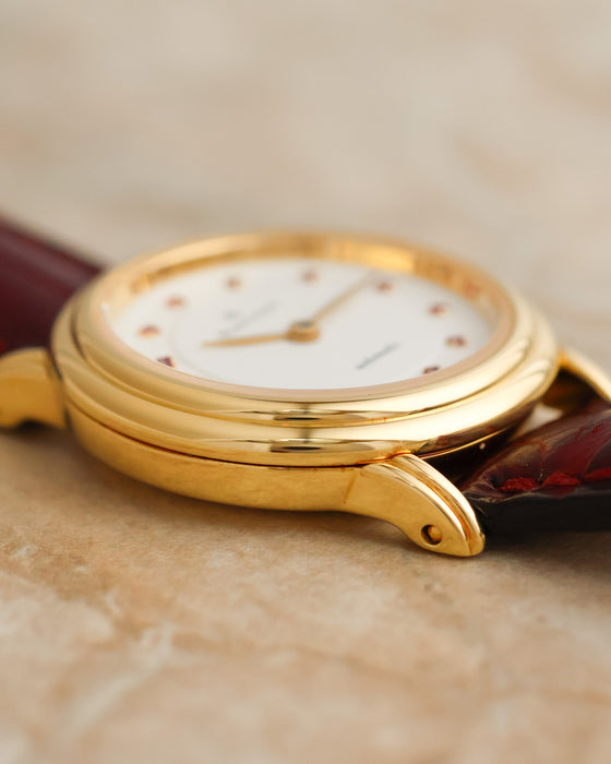 Close-up of the Blancpain Villeret 0096 gold case showing its layered bezel construction and curved lug profile.