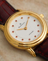 Angled close-up of the Blancpain Lady Villeret dial featuring twelve pink gemstone indices in gold settings and slim gold hands.